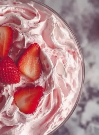 Creamy pink fluff dessert in a bowl, ready to serve.