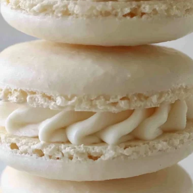 Delicious aquafaba vegan macarons on a decorative plate