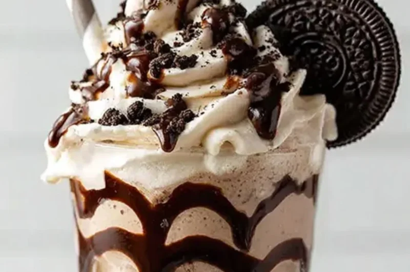 Delicious Bailey's Cookies and Cream Shake with whipped cream and cookie crumbs