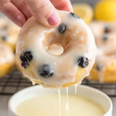 Delicious baked lemon blueberry donuts topped with a light glaze