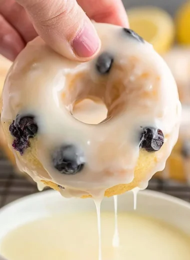 Delicious baked lemon blueberry donuts topped with a light glaze