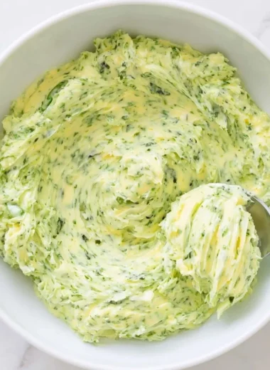 Delicious Basil Pesto Butter spread on fresh bread