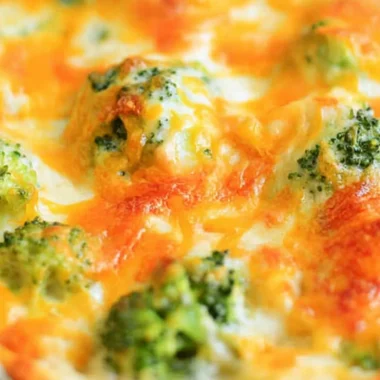 Cheesy Chicken Broccoli Bake served in a dish with melted cheese and broccoli