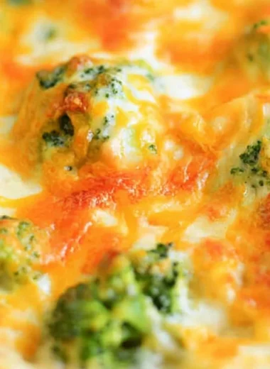 Cheesy Chicken Broccoli Bake served in a dish with melted cheese and broccoli