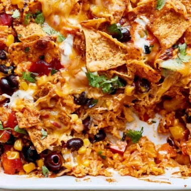 Cheesy Dorito Veggie Casserole with colorful vegetables and Doritos topping.