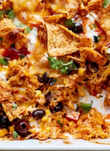Cheesy Dorito Veggie Casserole with colorful vegetables and Doritos topping.