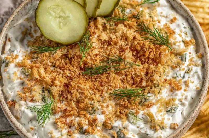 Bowl of easy fried pickle dip with crispy pickles on top, dairy-free option.