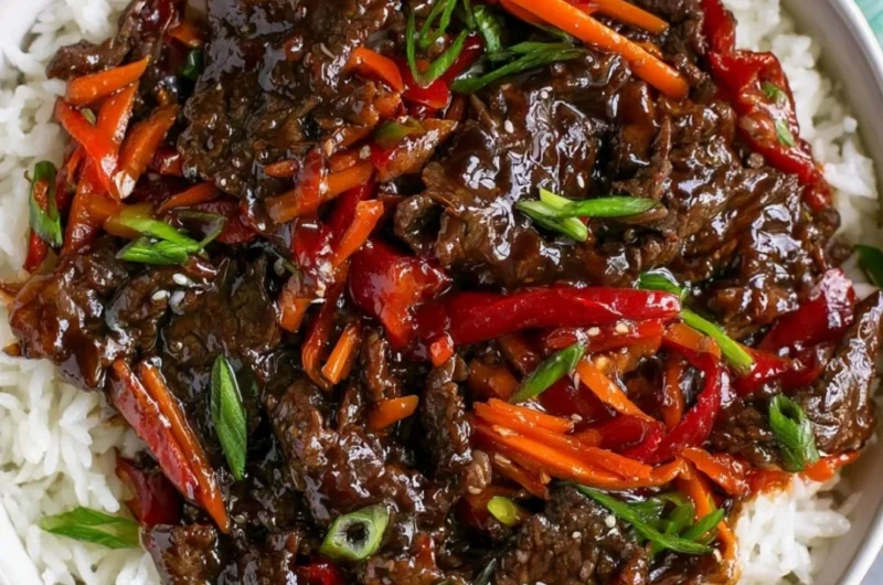 Delicious easy Mongolian beef served with rice and vegetables