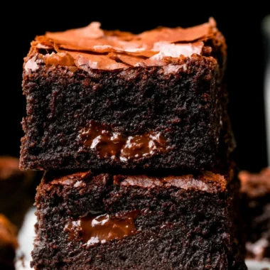 Delicious fudgy brownies on a plate, rich in chocolate flavor