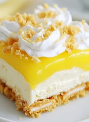 Heavenly Lemon Oreo Dessert with zesty lemon cream and Oreo crust