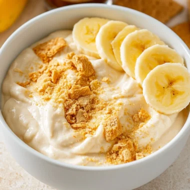 High Protein Banana Pudding Bowl with bananas and creamy layers