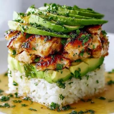 Honey Lime Chicken Avocado Rice Stack served in a colorful bowl