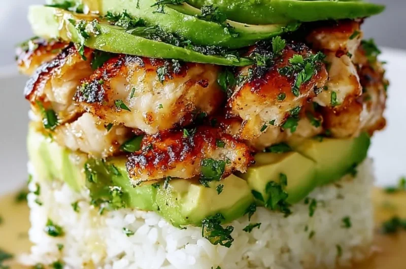 Honey Lime Chicken Avocado Rice Stack served in a colorful bowl