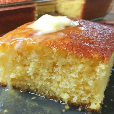 Deliciously moist Jiffy Cornbread served warm in a golden dish