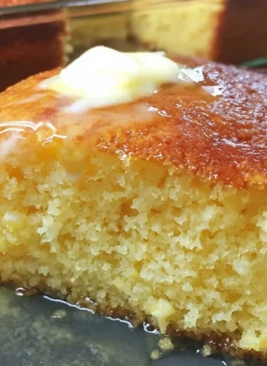 Deliciously moist Jiffy Cornbread served warm in a golden dish