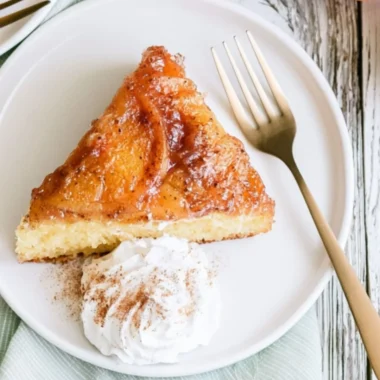 Delicious Peach Upside Down Cake topped with caramelized peaches and golden crust.