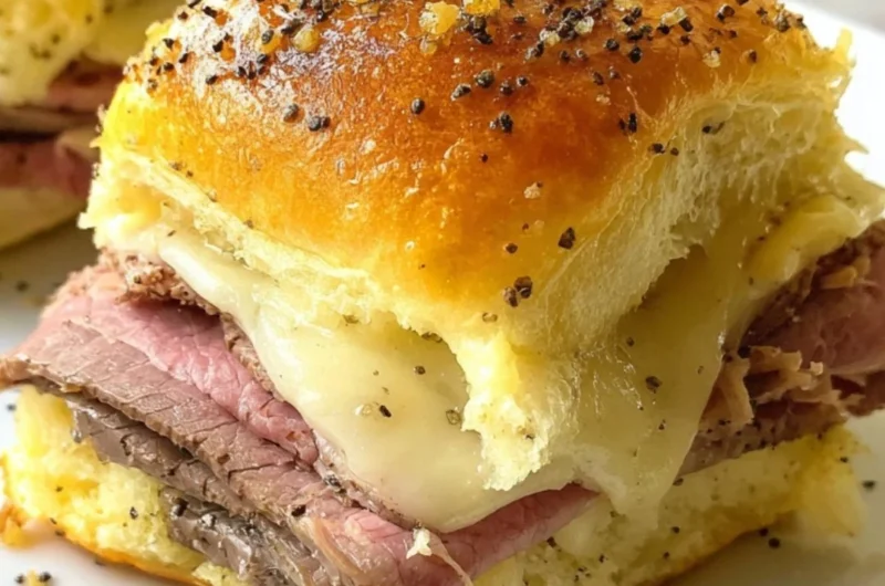 Delicious roast beef sliders served on a platter with condiments