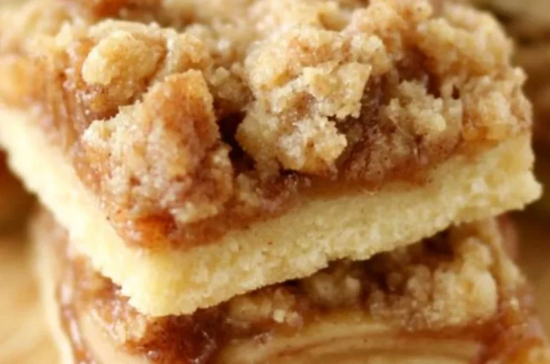 Delicious Apple Crisp Shortbread Bars topped with a crispy oat topping.