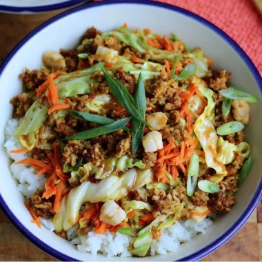 Easy egg roll in a bowl with colorful vegetables and savory pork