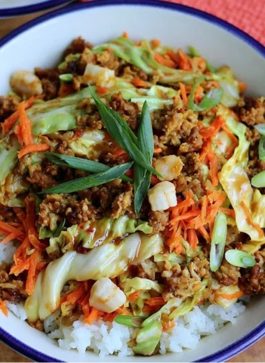 Easy egg roll in a bowl with colorful vegetables and savory pork