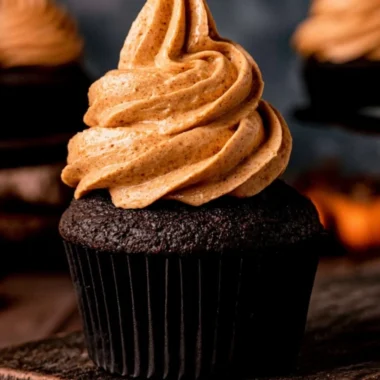 Delicious homemade chocolate pumpkin cupcakes with creamy frosting.