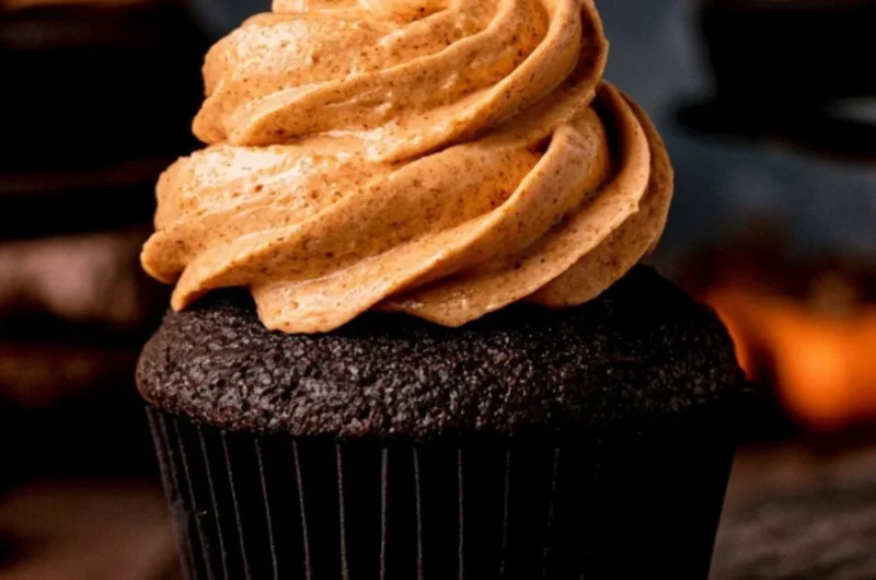 Delicious homemade chocolate pumpkin cupcakes with creamy frosting.