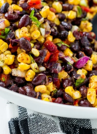 Fresh Corn Salsa made with corn, tomatoes, and herbs in a bowl