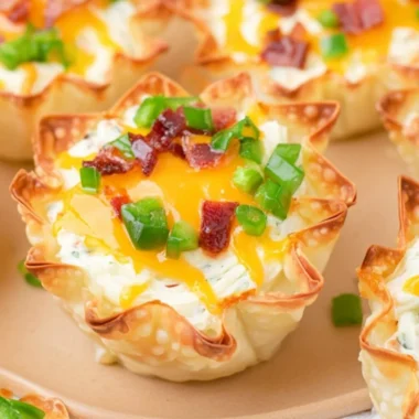Crispy Jalapeño Popper Wonton Cups garnished for a delicious appetizer