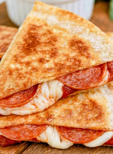 Delicious pizza quesadillas filled with cheese and toppings.