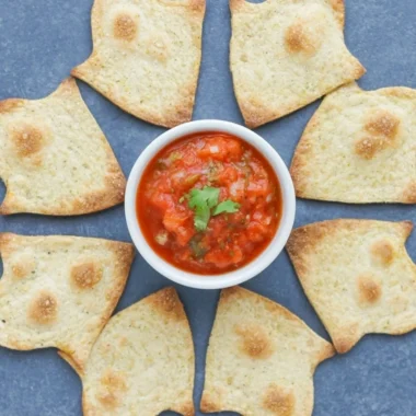 Bowl of spooky baked Halloween chips, perfect for festive snacking.