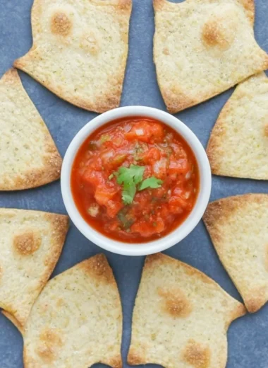 Bowl of spooky baked Halloween chips, perfect for festive snacking.