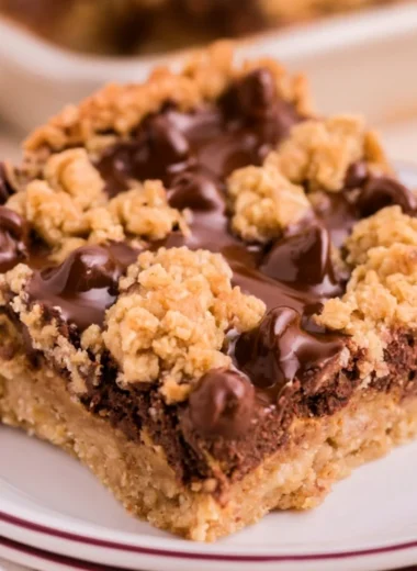 Delicious Chocolate Peanut Butter Oatmeal Bars on a wooden table
