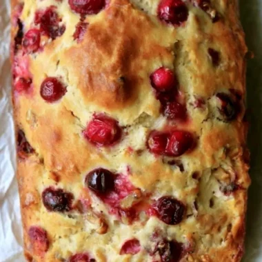 Freshly baked Mom's Cranberry Walnut Bread with cranberries and walnuts
