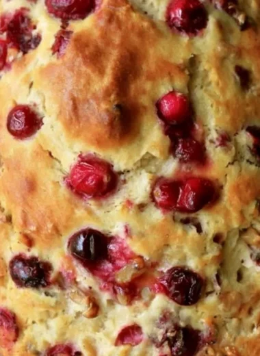 Freshly baked Mom's Cranberry Walnut Bread with cranberries and walnuts
