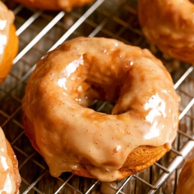 Delicious vegan pumpkin donuts topped with glaze and spices