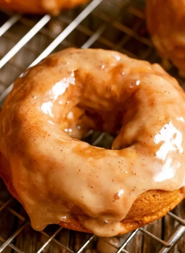 Delicious vegan pumpkin donuts topped with glaze and spices